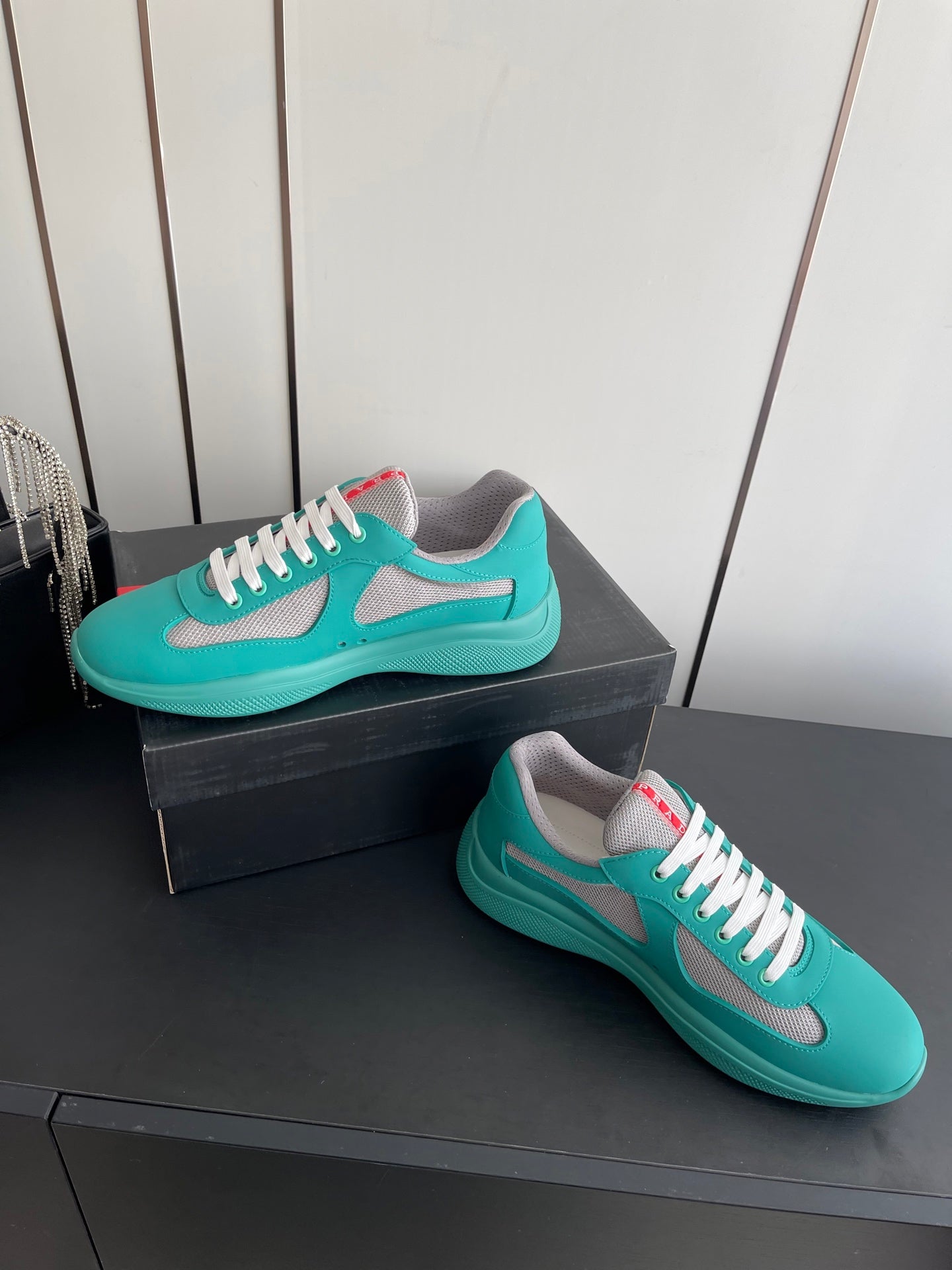 PRADA 26S AMERICA CUP SNEAKERS IN TEAL BLUE SOFT RUBBER AND BIKE FABRIC