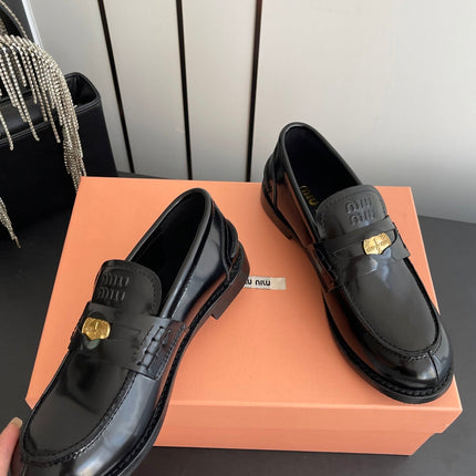 MIUMIU 26S PENNY LOAFERS IN BLACK GLOSSY CALFSKIN GOLD HARDWARE
