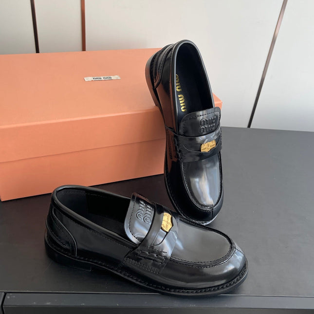MIUMIU 26S PENNY LOAFERS IN BLACK GLOSSY CALFSKIN GOLD HARDWARE