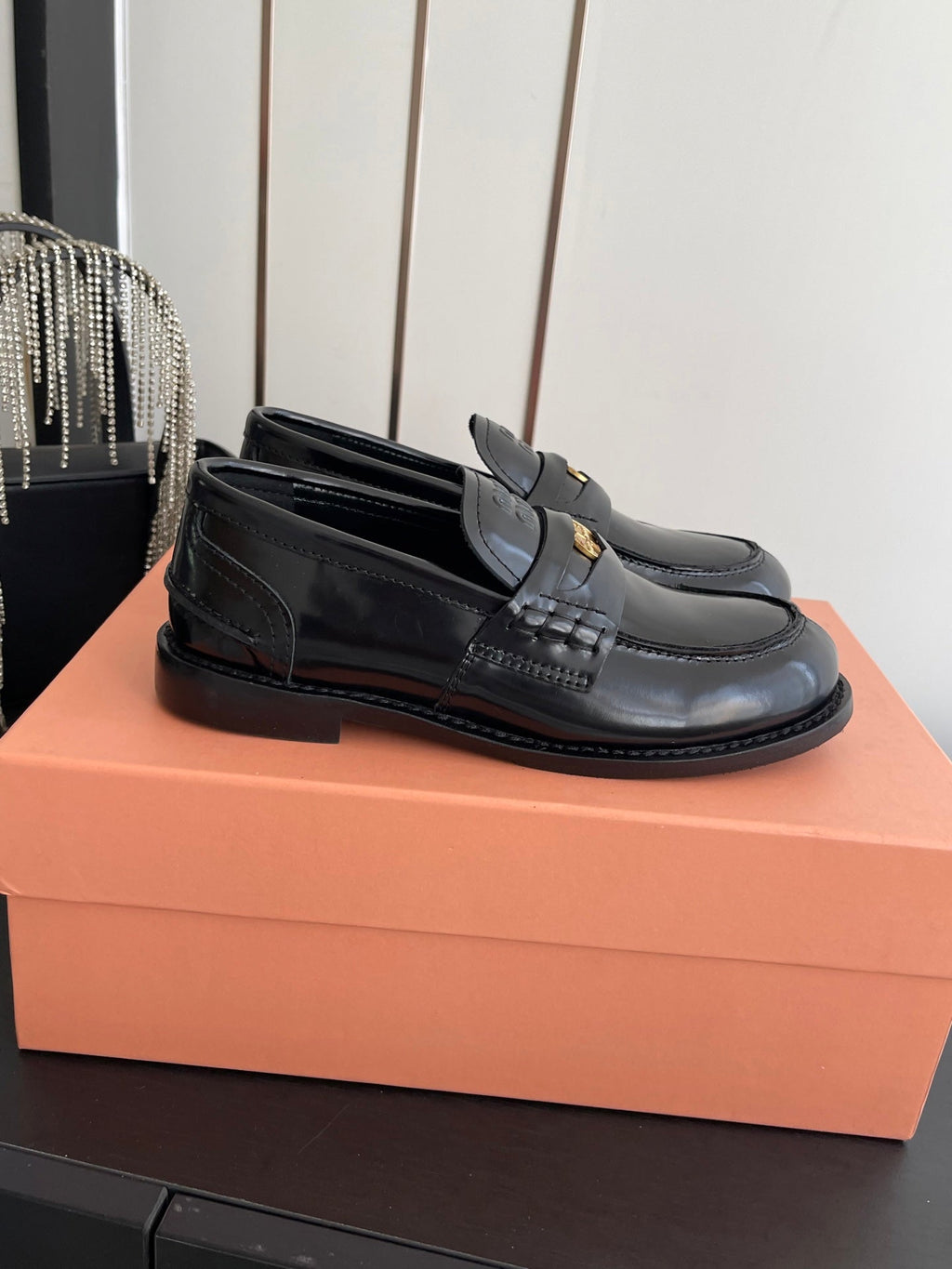 MIUMIU 26S PENNY LOAFERS IN BLACK GLOSSY CALFSKIN GOLD HARDWARE