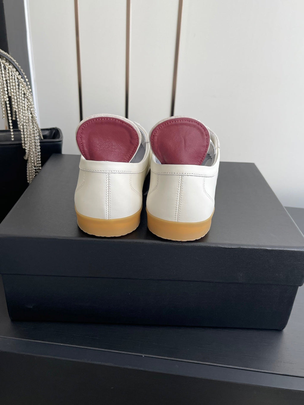 CHANEL LOW-TOP SNEAKERS IN BLACK AND WHITE CALFSKIN MIX SUEDE
