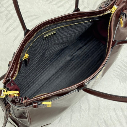 PRADA 25S BONNIE EXTRA-LARGE 42 IN DARK BROWN GLOSSY CALFSKIN GOLD HARDWARE