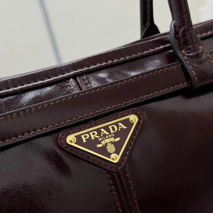 PRADA 25S BONNIE LARGE HANDBAG 38 IN BURGUNDY GLOSSY CALFSKIN GOLD HARDWARE