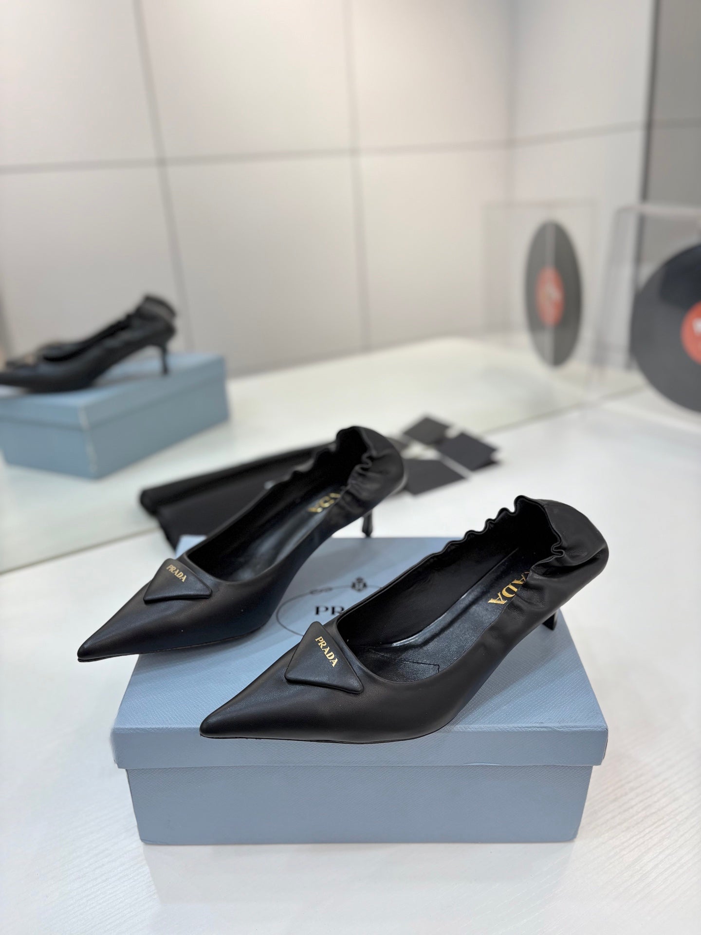 PRADA 26S PUMPS 55MM IN BLACK CALFSKIN WITH LOGO