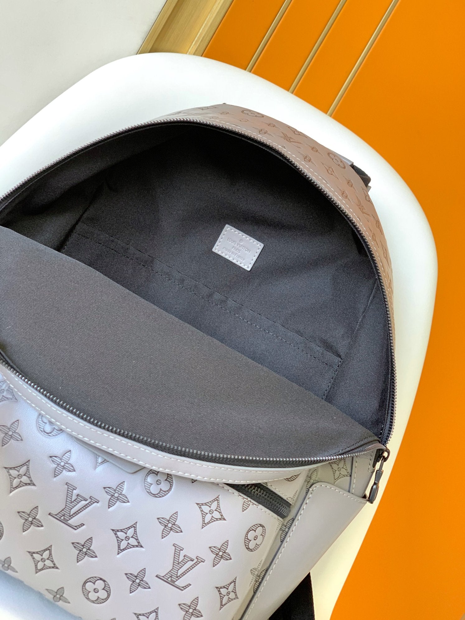 DISCOVERY BACKPACK 38 IN GREY MONOGRAM ECLIPSE CANVAS AND TAURILLON