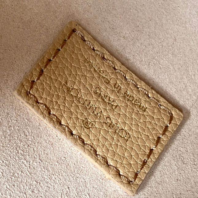 LV 25S LOW KEY HOBO BAG 28 CM IN BEIGE CALFSKIN