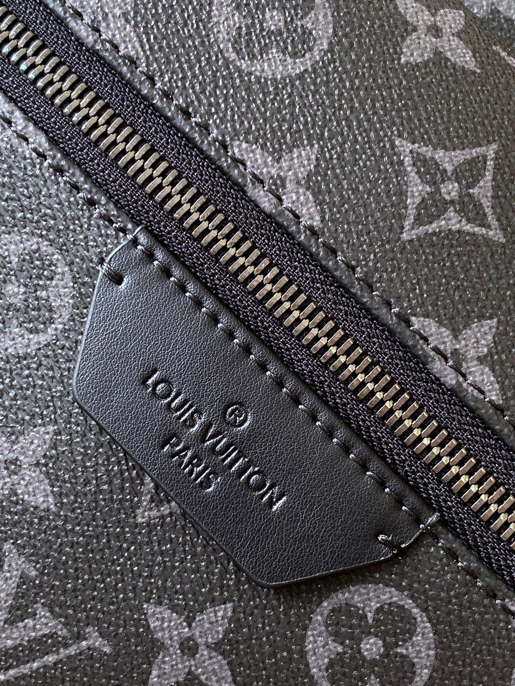 DISCOVERY BACKPACK 38 IN BLACK MONOGRAM ECLIPSE CANVAS AND TAURILLON