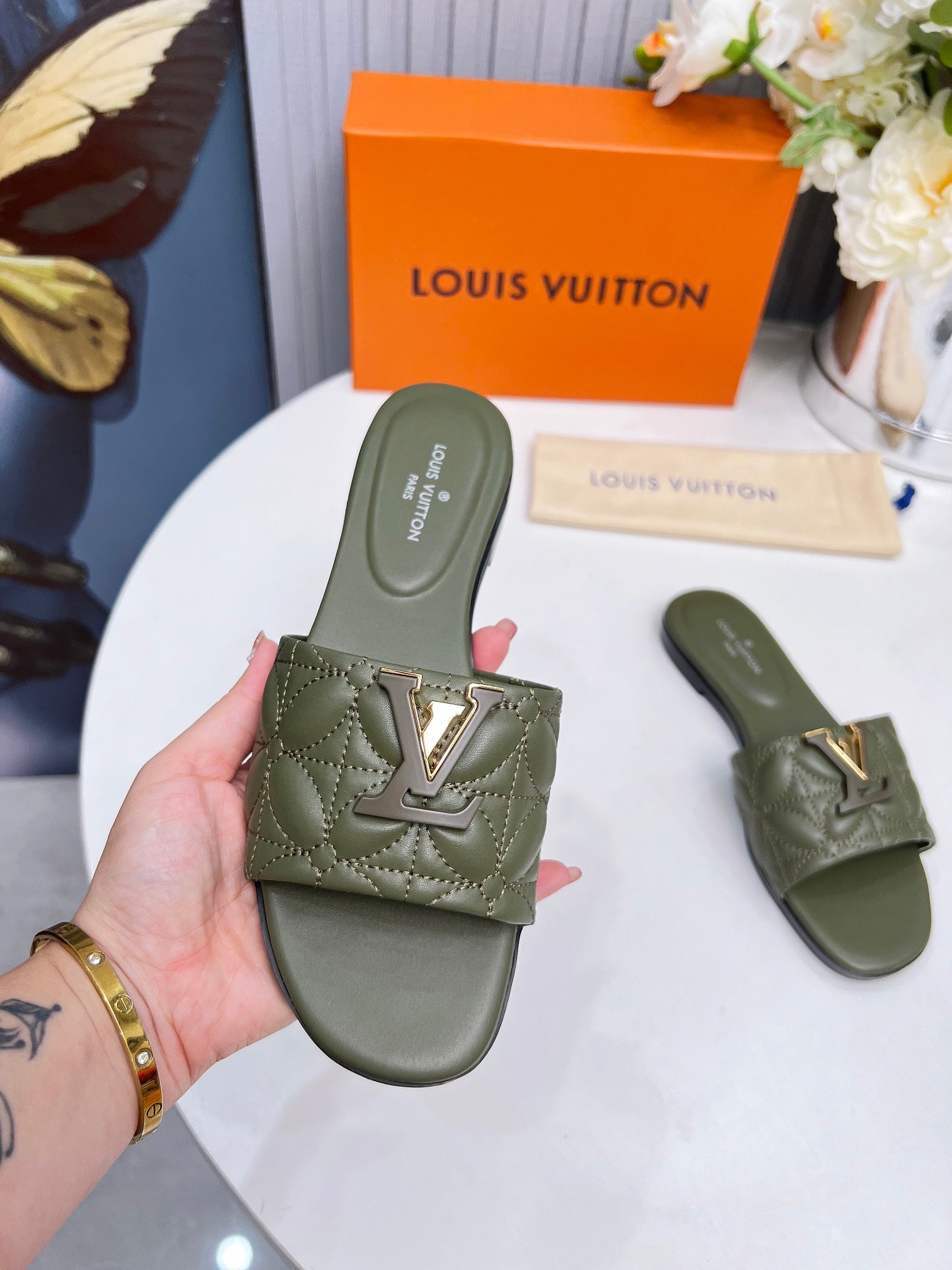 LV 26S MARE FLAT MULES IN MOSS GREEN CALFSKIN