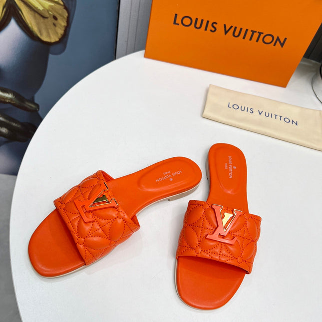 LV 26S MARE FLAT MULES IN ORANGE CALFSKIN