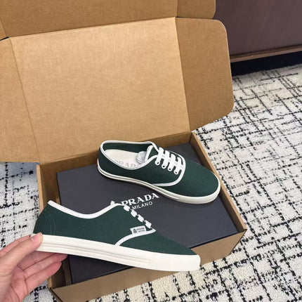 PRADA 26S LACE UP SNEAKERS IN DARK TEAL CANVAS
