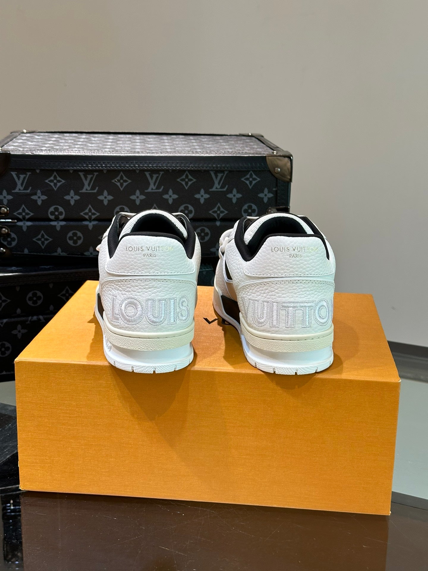 LV TRAINER SNEAKERS IN WHITE CALFSKIN AND BLACK SUEDE