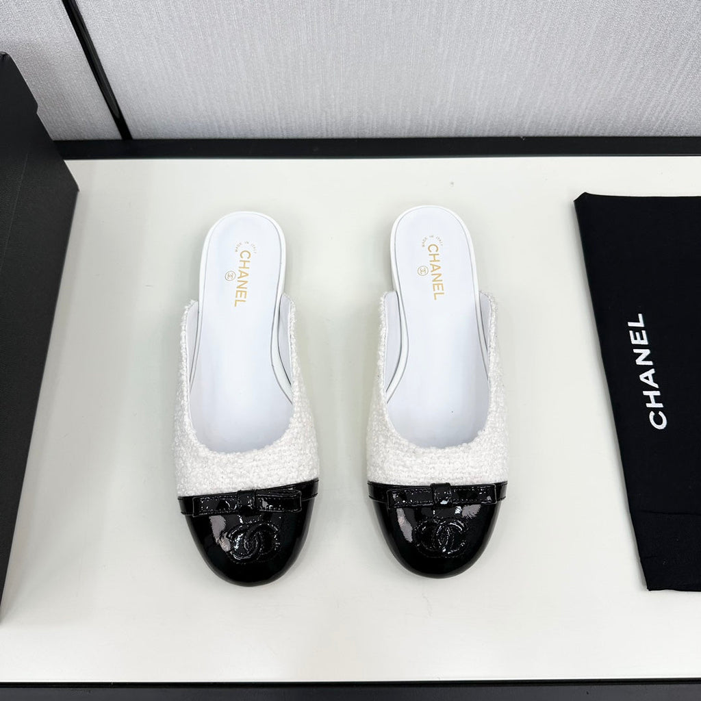 BOW MULE IN WHITE FUR AND BLACK CALFSKIN