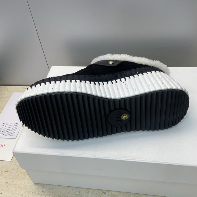 CHLOÉ 26S FUR-LINED WEDGE MULES IN BLACK SUEDE