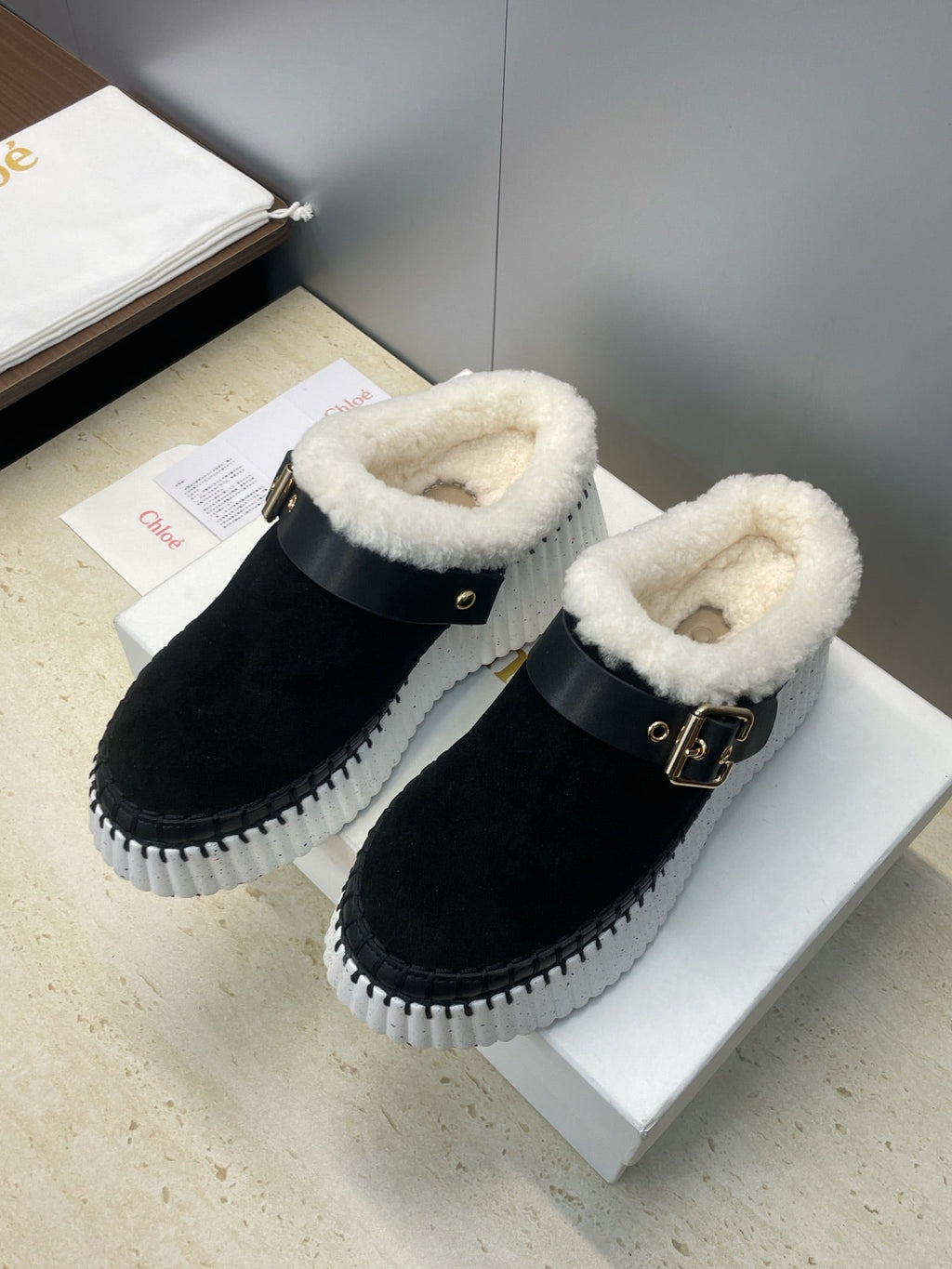 CHLOÉ 26S FUR-LINED WEDGE MULES IN BLACK SUEDE