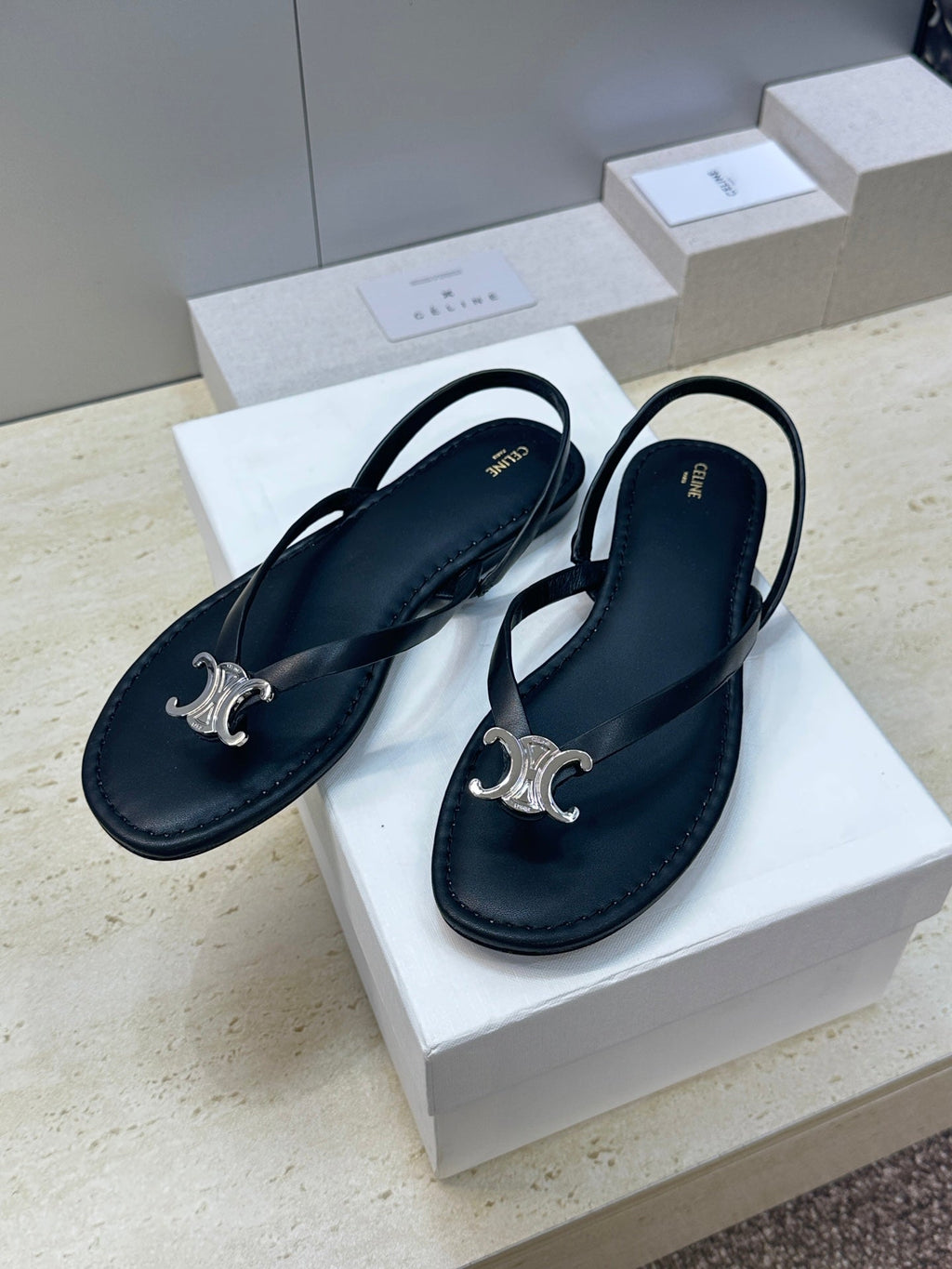 CELINE 26S THONG SANDALS IN BLACK CALFSKIN