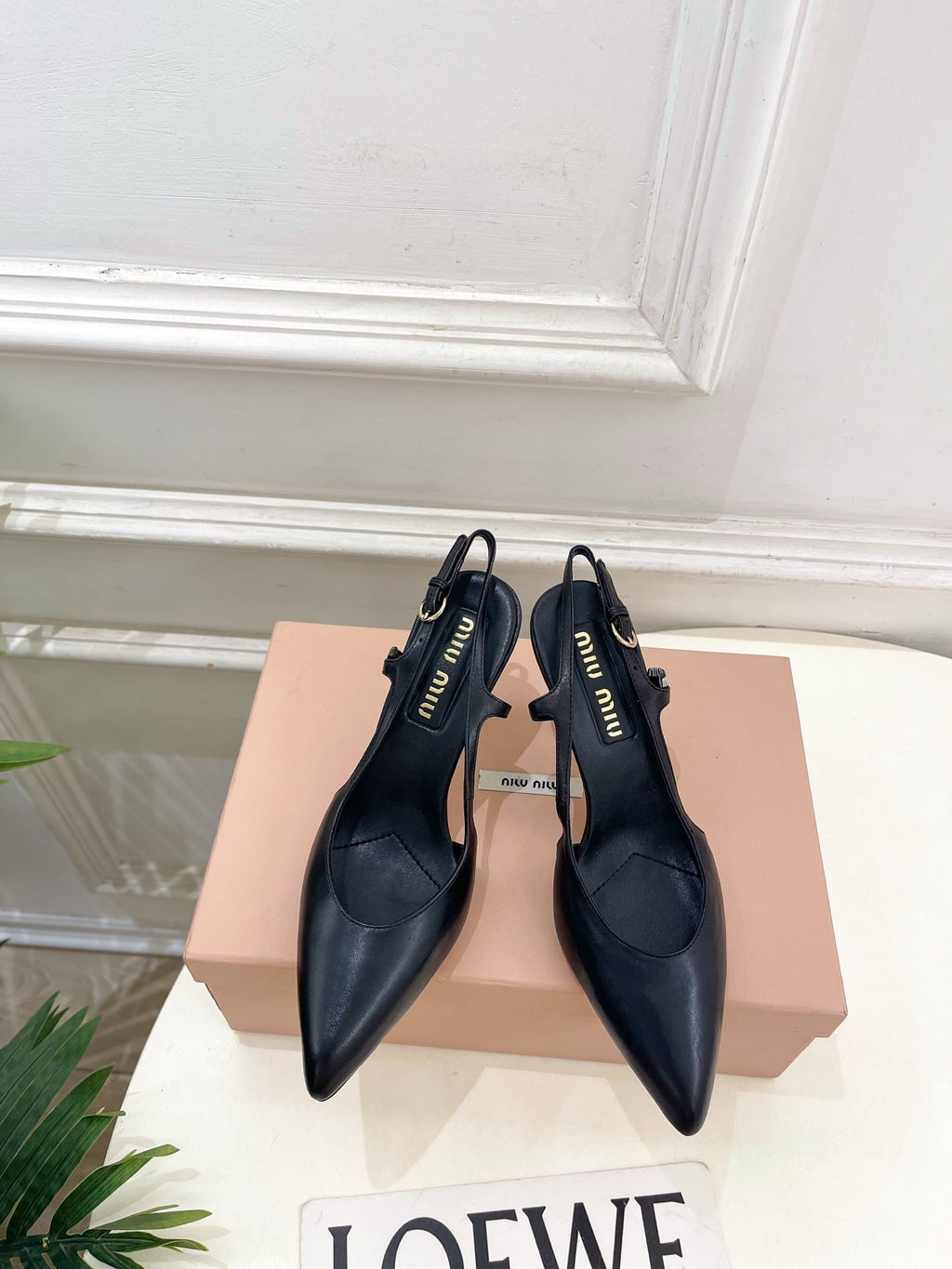 MIUMIU 26S SLINGBACK PUMPS 85MM IN BLACK CALFSKIN