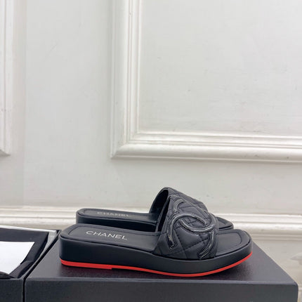 CHANEL 26S FLAT SLIDES IN BLACK LAMBSKIN WITH CC LOGO