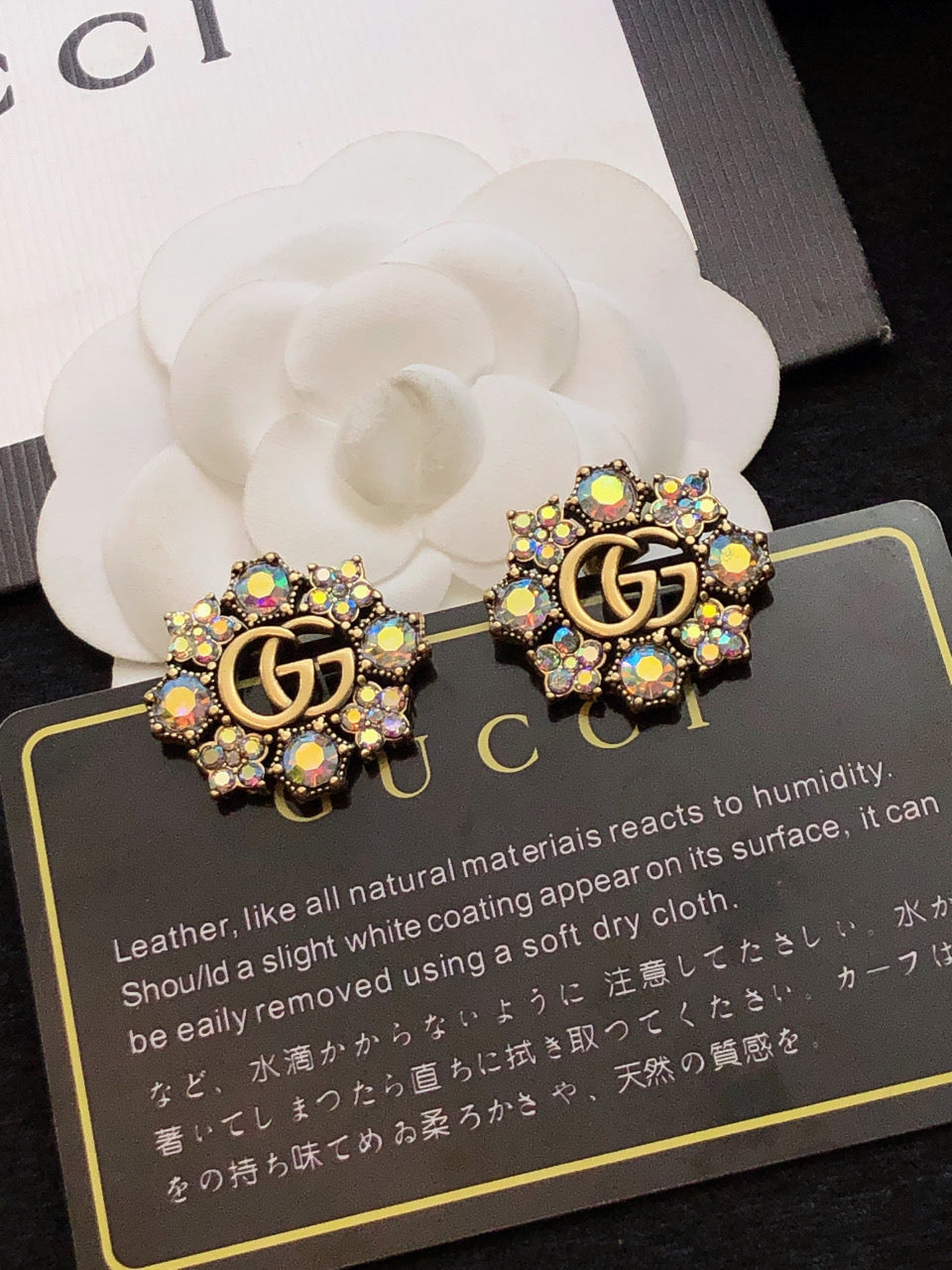 GUCCI 26S DOUBLE G LOGO MULTICOLOR CRYSTAL FLORAL STATEMENT STUD EARRINGS IN AGED GOLD TONE METAL 629028