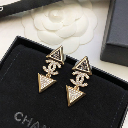 CHANEL 26S DOUBLE C LOGO TWO-TONE CRYSTAL TRIANGLE DROP EARRINGS IN GOLD METAL 631834