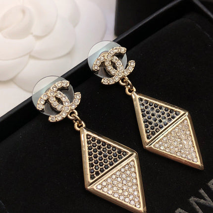 CHANEL 26S DOUBLE C LOGO TWO TONE PAVE CRYSTAL DIAMOND SHAPE DROP EARRINGS IN GOLD METAL 631833